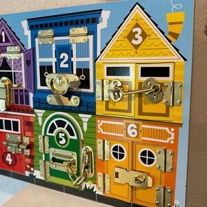 Melissa & Doug Latches Board